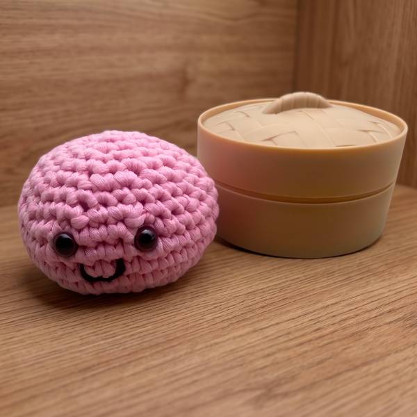 The dumpling and steamer on a wooden table